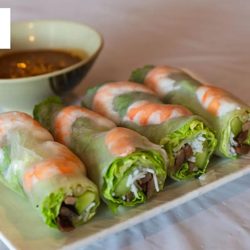 Vietnamese dishes shared around a table at Pho Mama Fremont